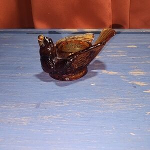 Eggcup bird salt cellar.